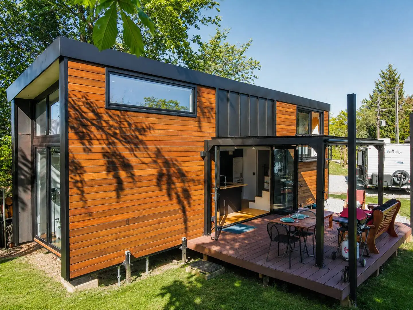 Exterior of the tiny house with mountain views